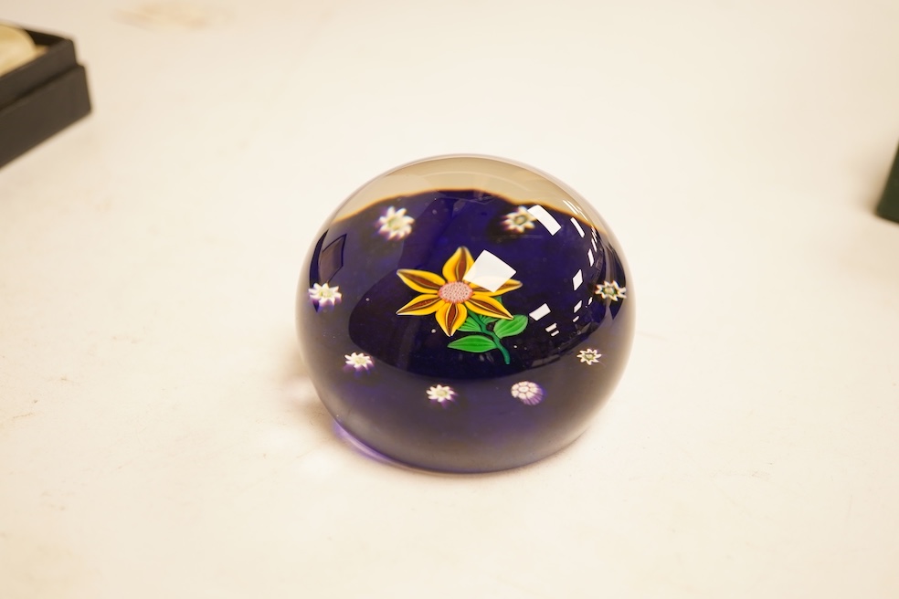 A boxed Paul Ysart floral paperweight, 7cm in diameter